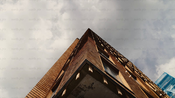 Modern wood building: Low angle view with upward pan of the wooden architecture
