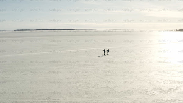 Winter cross-country skiing on frozen lake in Luleå