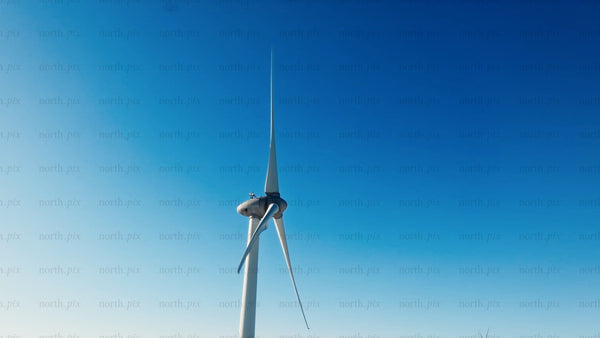 Wind turbine rotating slowly at Markbygden wind farm in winter