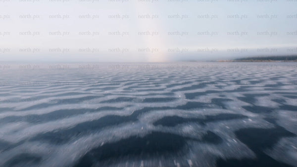 Frozen lake in arvidsjaur, Sweden - winter landscape drone footage