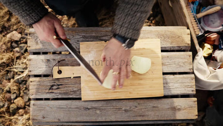 Chopping Onions Outdoors in the Winter Sun: Luleå Archipelago, Sweden
