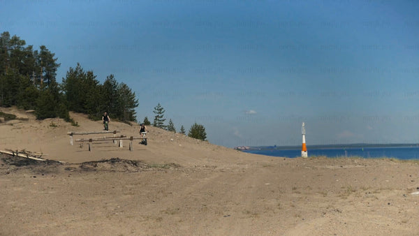 Summer fatbiking adventure: Friends exploring the coastal sands of Luleå