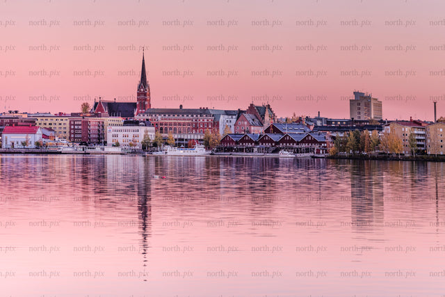 Norra hamn waterfront with church spire at sunset