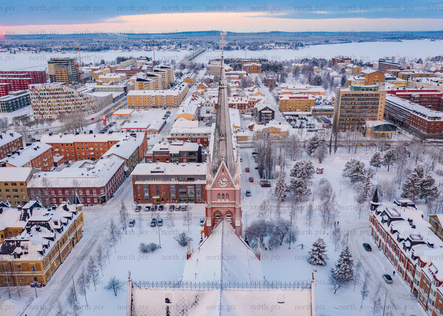 Drone view of Luleå city in winter during blue hour