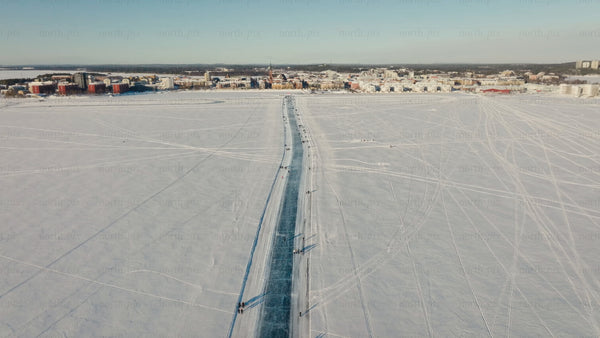 Winter in Luleå: Aerial view of ice skating on a frozen track