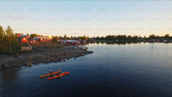 Kayaking in the Luleå archipelago at twilight in summer