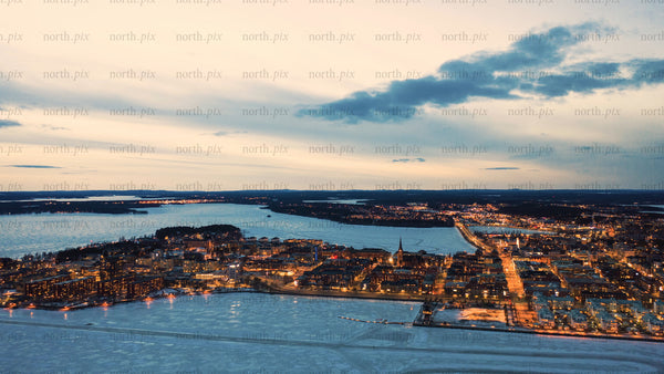 Luleå at dusk: A winter cityscape timelapse with frozen river