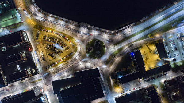 Luleå at night: Aerial timelapse of roundabout traffic flow
