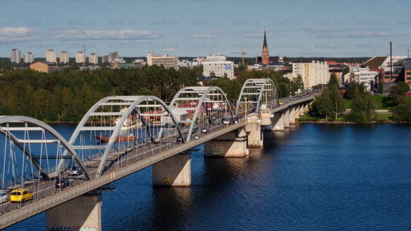 Aerial view of Luleå cityscape: Bergnäsbron bridge and Luleälven in summer