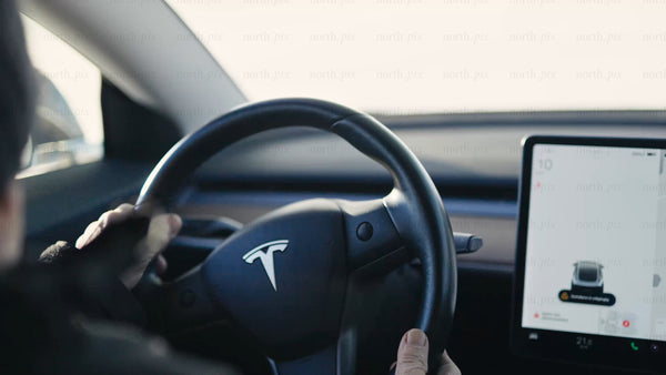 Driving a Tesla/car in wintery Luleå: A golden hour POV perspective