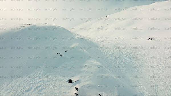 Snowy mountain landscape in riksgransen, Sweden - aerial drone view