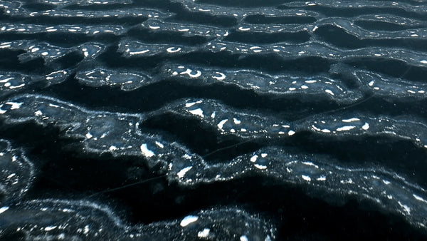 Aerial view of frozen lake in arvidsjaur, Sweden, winter landscape