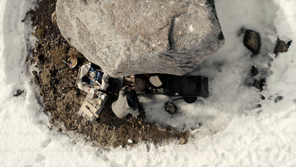 Winter cooking in the Luleå archipelago: Drone view of a snowy campsite