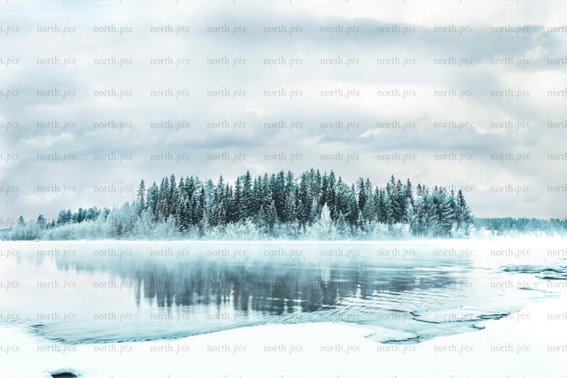 Gäddviksströmmen - winter forest island reflected on a frozen lake