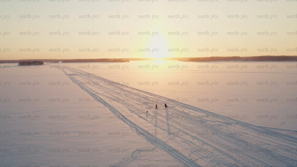 Winter sunset walk on a frozen lake in Luleå