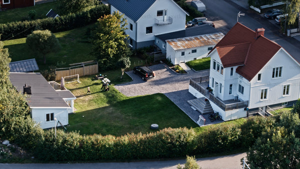 Aerial view of family home in Luleå, on a sunny summer evening