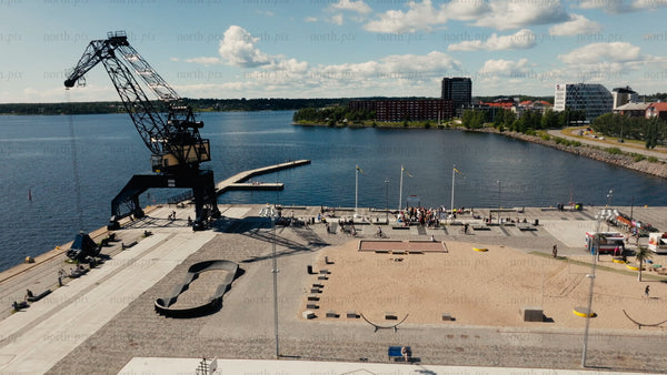 Summer in Luleå: Aerial view of harbor, cityscape, and beach activity