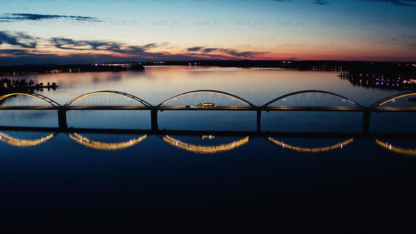 Luleå: Sunset over Bergnäsbron bridge - aerial drone footage
