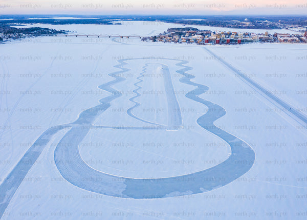 Aerial view of winter ice track in Luleå during the blue hour