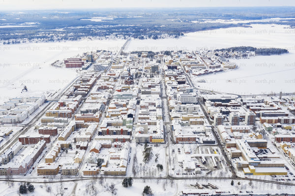 Aerial view of Luleå city center in winter snowy landscape from above