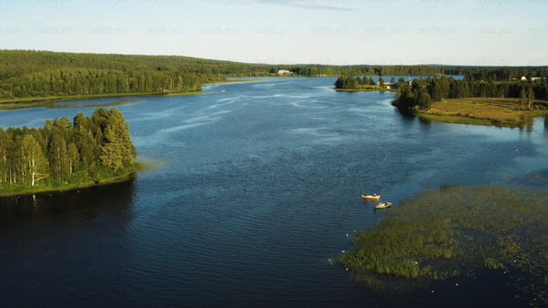 Summer day on a Swedish river: Kayaking amidst islands and forests