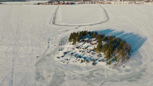 Winter in Lulea: Aerial View of Frozen Lake, Island Gathering, and Ice Skating Track