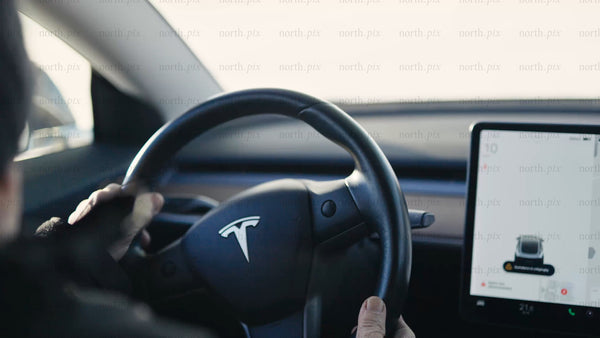 Driving a Tesla/car in wintery Luleå: A golden hour POV perspective