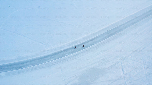 Aerial view of cross-country skiers in snowy Luleå