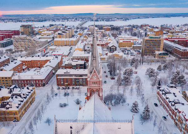 Drone view of Luleå city in winter during blue hour