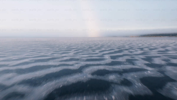 Frozen lake in arvidsjaur, Sweden - winter landscape drone footage