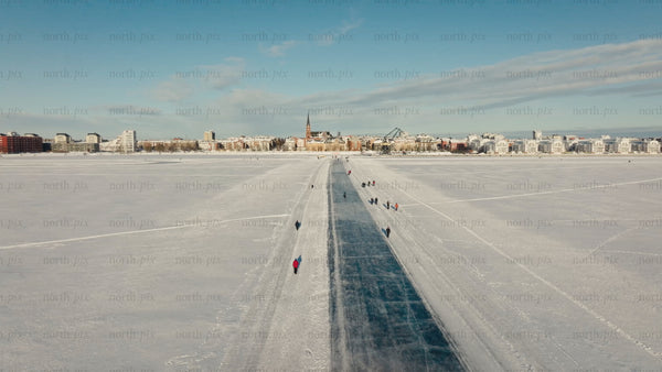 Winter ice skating in Luleå: A sunny day on the frozen lake