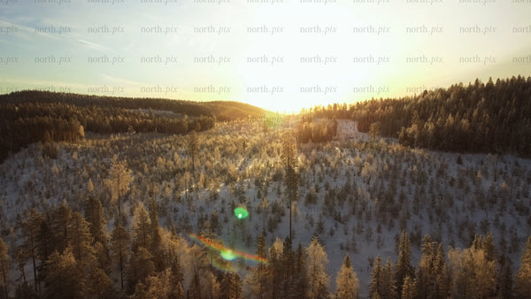 Winter landscape in Gunnarsbyn at sunset
