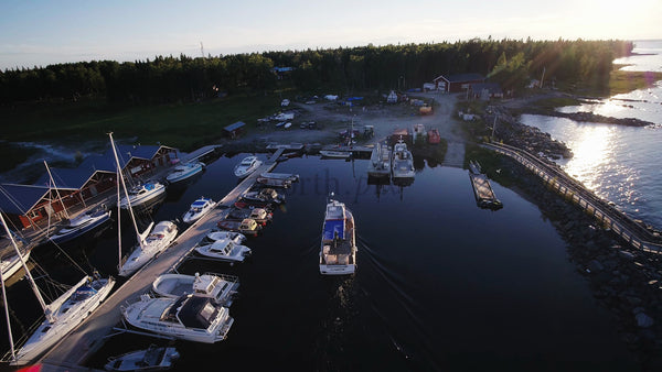 Summer Evening in Lulea: Aerial View of Junkön Archipelago Harbor at Golden Hour