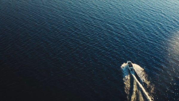 Summer evening boat trip in the Luleå archipelago at golden hour
