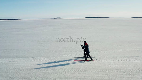 Winter Cross-Country Skiing on Frozen Lake in Luleå, Sweden