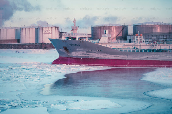 Cargo tanker at industrial port in winter morning
