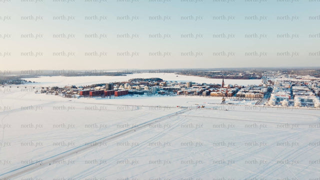 Winter in Luleå: Aerial drone view of frozen river and city center