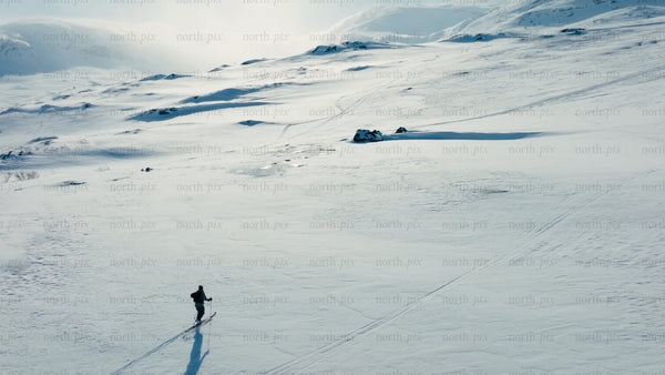 Backcountry skiing in Riksgränsen on a sunny winter day
