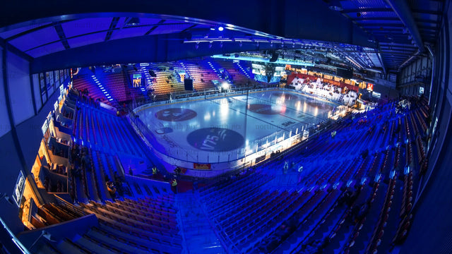 Timelapse of a hockey game in a packed arena with cheering fans