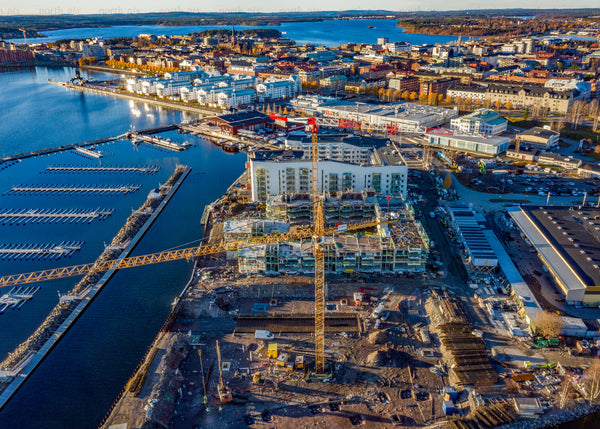 Aerial view of coastal urban landscape under construction during autumn day