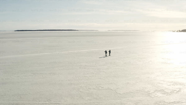 Winter cross-country skiing on frozen lake in Luleå