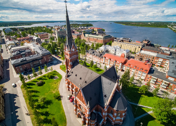Aerial view of Luleå cityscape and church in bright summer day