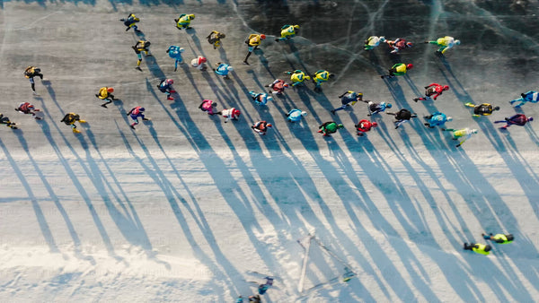 Winter ice skating marathon: Drone shot of athletes in Luleå