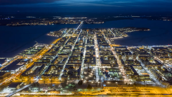 Luleå city at night: Aerial drone winter timelapse