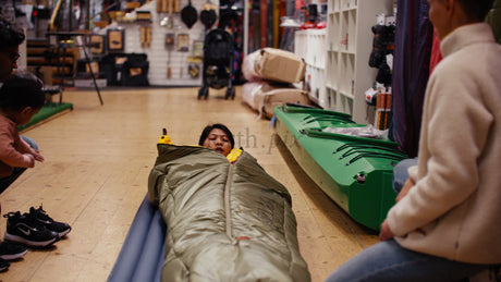 Family Camping Adventure: Shopping for Gear at a Retail Store