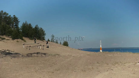Summer Fatbiking Adventure: Friends Exploring the Coastal Sands of Luleå, Sweden