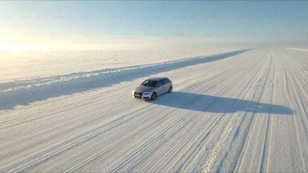 Driving on a snow-covered ice road in Luleå, winter
