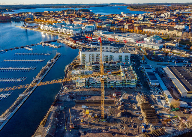 Aerial view of coastal urban landscape under construction during autumn day