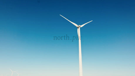 Wind Turbine Rotating in Markbygden, Sweden: Winter Drone View of Renewable Energy