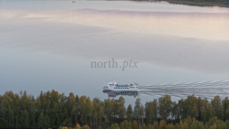 Lulea, Sweden: Sunset Ferry Across the Calm Lake in Summer